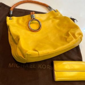 Michael Kors yellow bag with braided handle and a free wallet